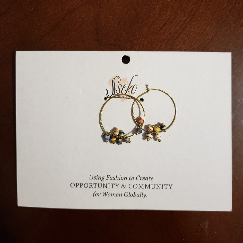 Tiny hoop earrings in rainbow